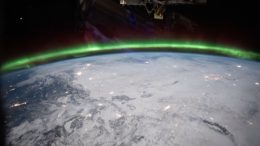 Aurora Glows Above Earth