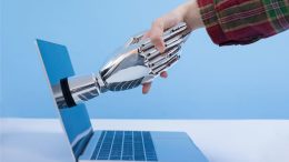 Human Robot Shaking Hands Laptop